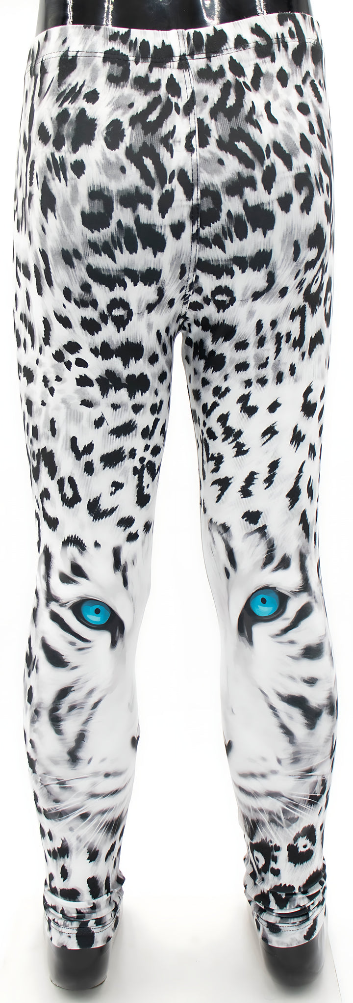 Kids snow leopard print leggings on a mannequin, symmetrical spotted pattern with blue eyes, front studio shot.