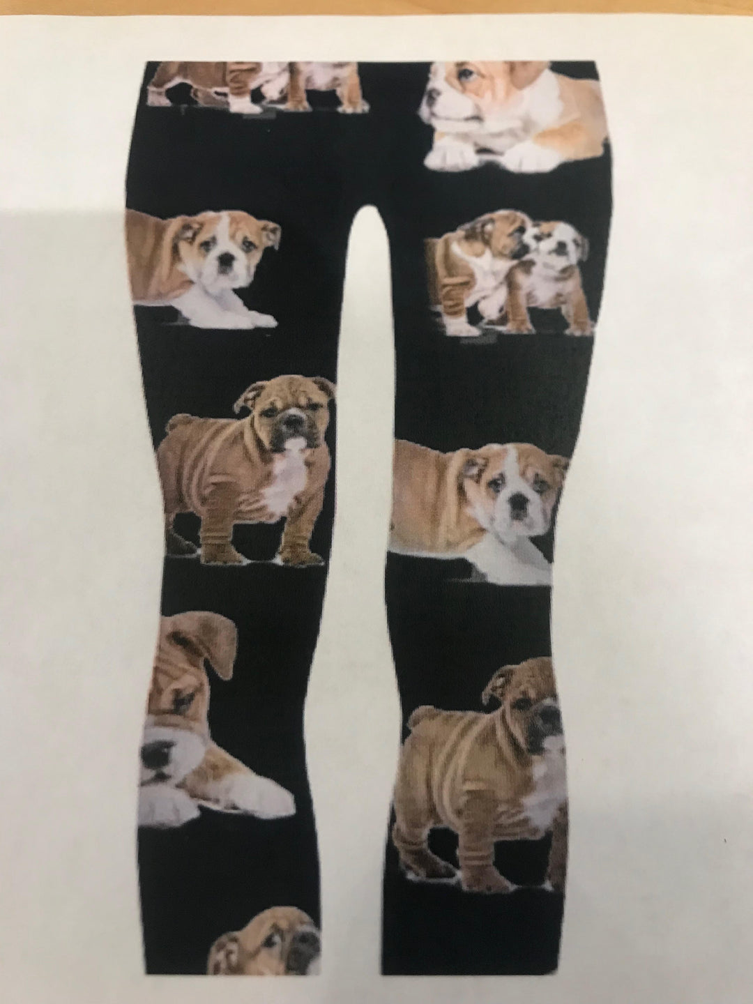 Denimaxx Bulldog Puppy print loungewear leggings with all-over tan and white bulldog puppy photos on black fabric.