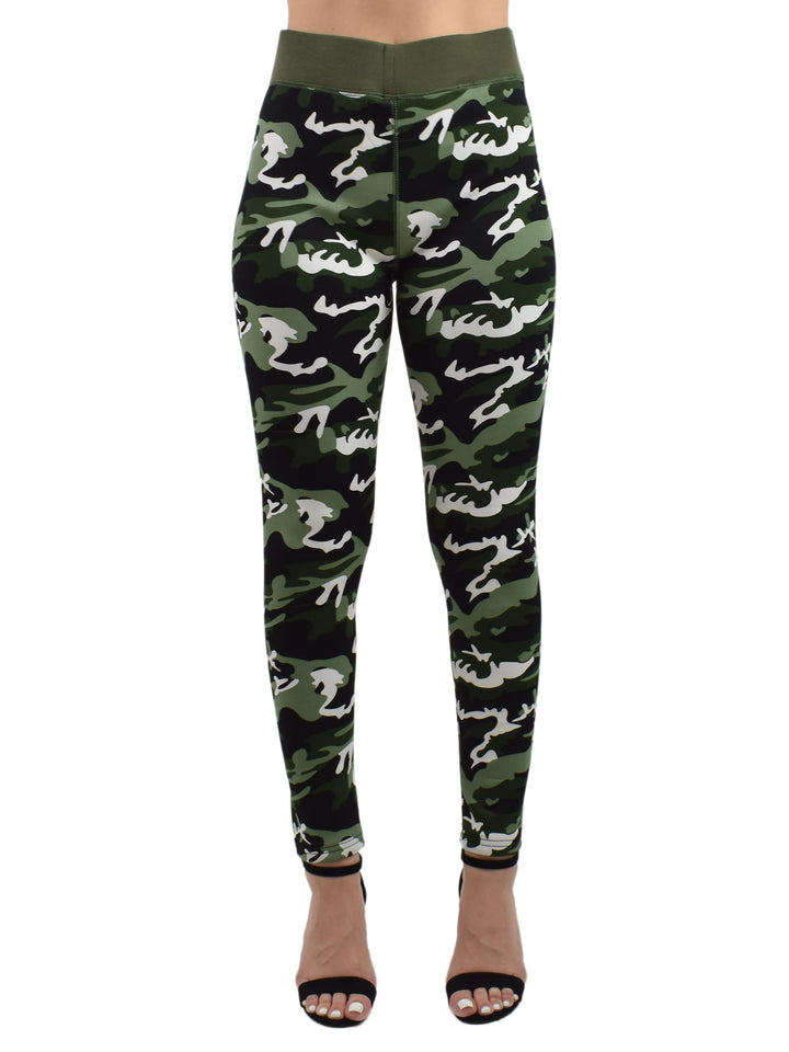 Front view of Denimaxx Northern Woods camo leggings with green, black, and white woodland print and olive waistband, studio shot.