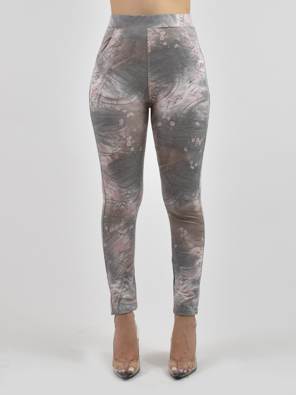 Women’s fitted jean leggings featuring adjustable waistband and sculpting four-way stretch fabric.
