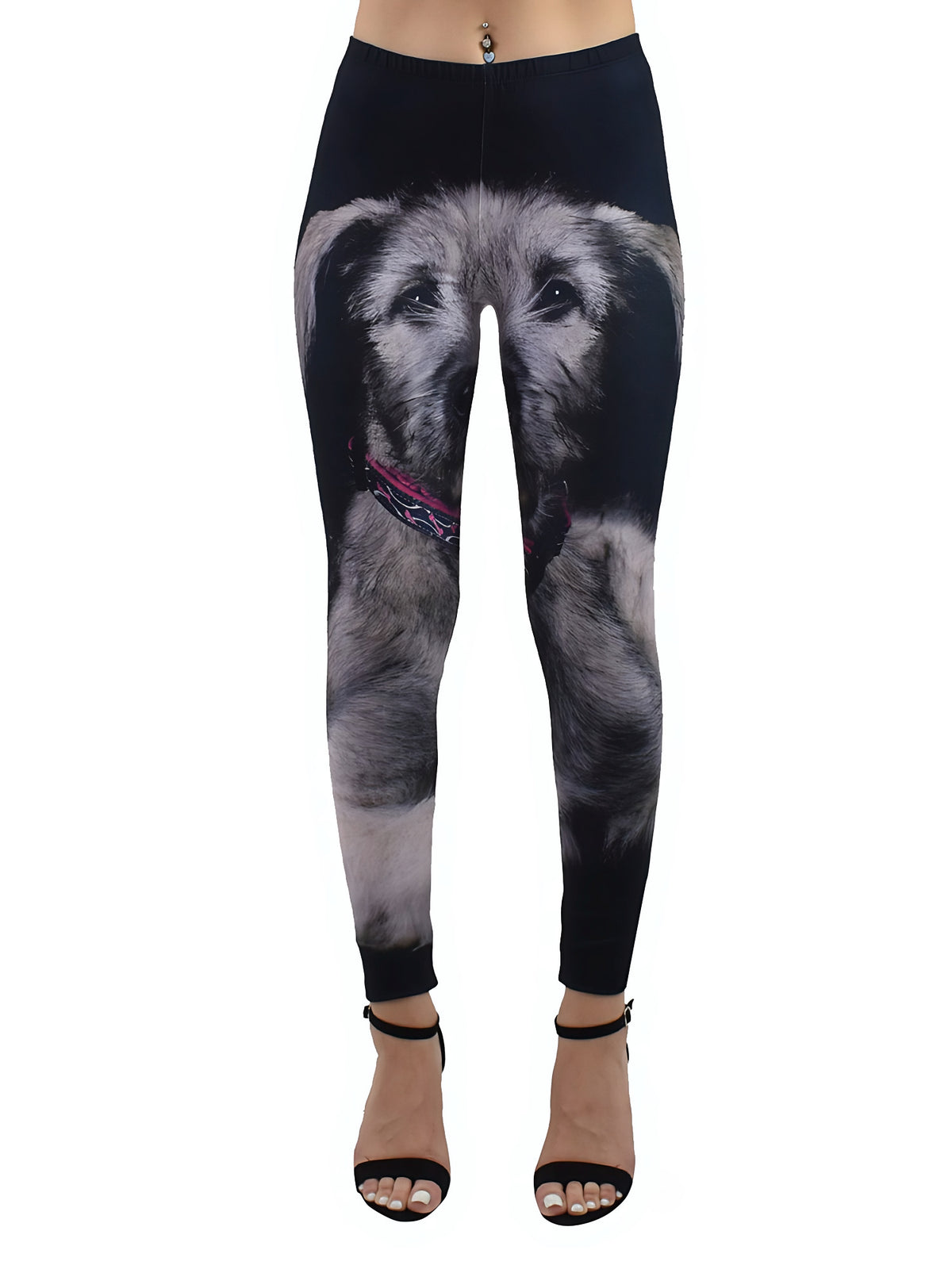 Young girl with hand on hip wearing kids leggings with an all-over Chow Chow dog print and a black tank top, standing in a marble lobby.