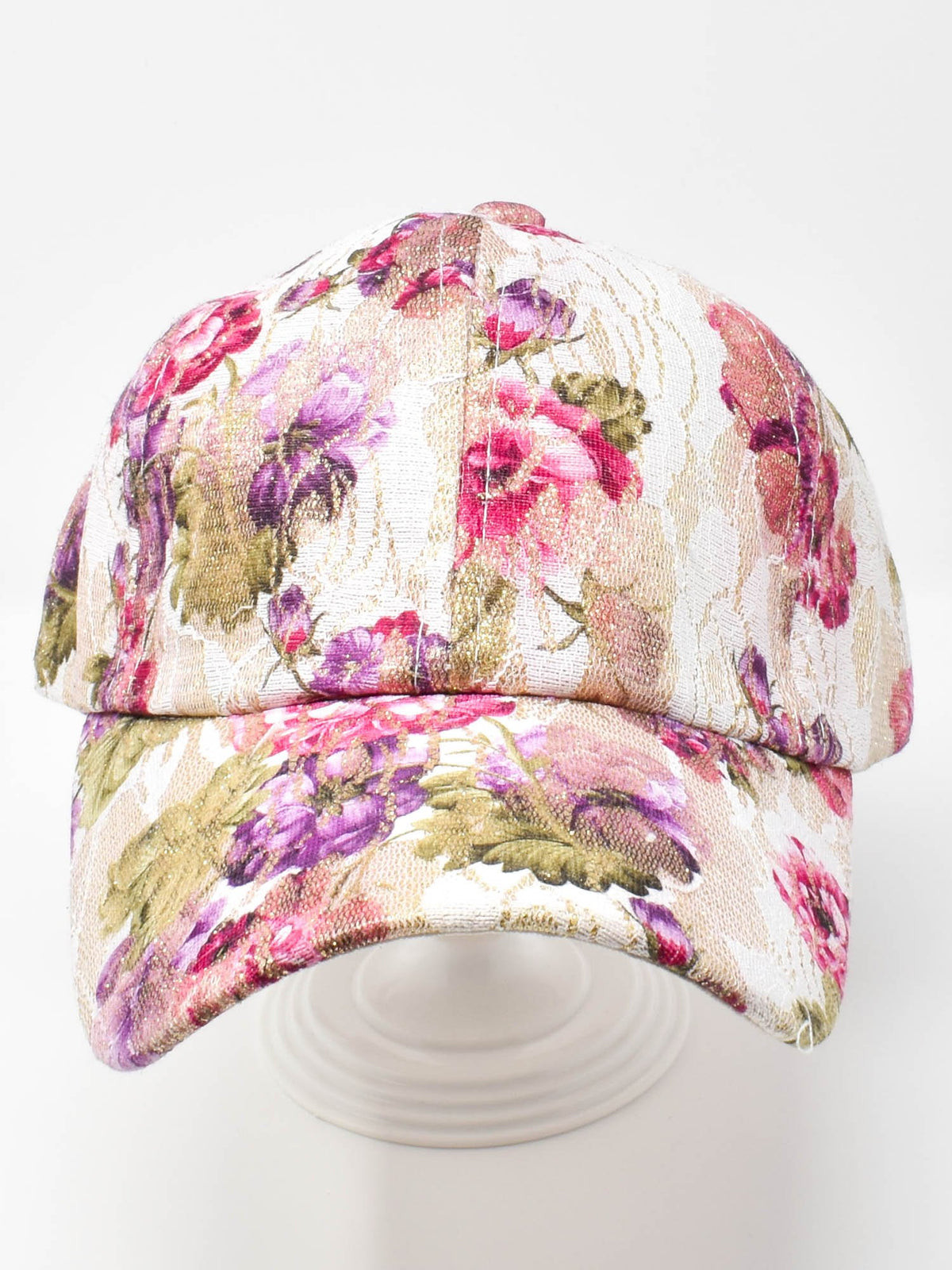 Violets and Roses floral baseball cap with pink and violet rose print on white fabric, studio front view.