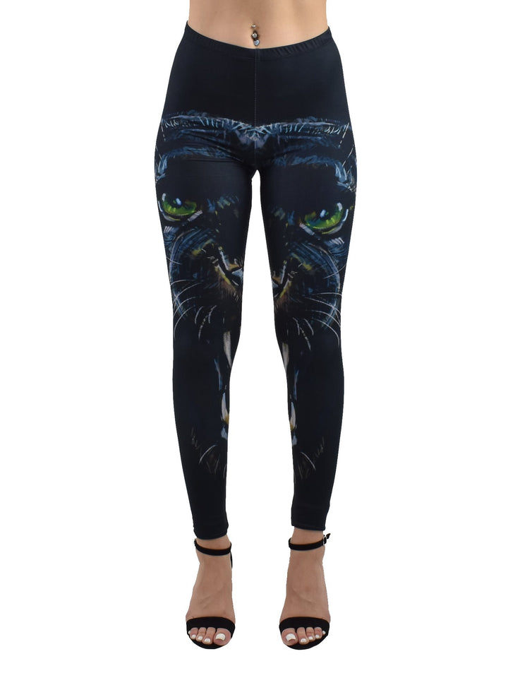 Front view of Denimaxx Enraged Black Puma leggings with black puma face and green eyes artwork, styled with black heels on a white background.
