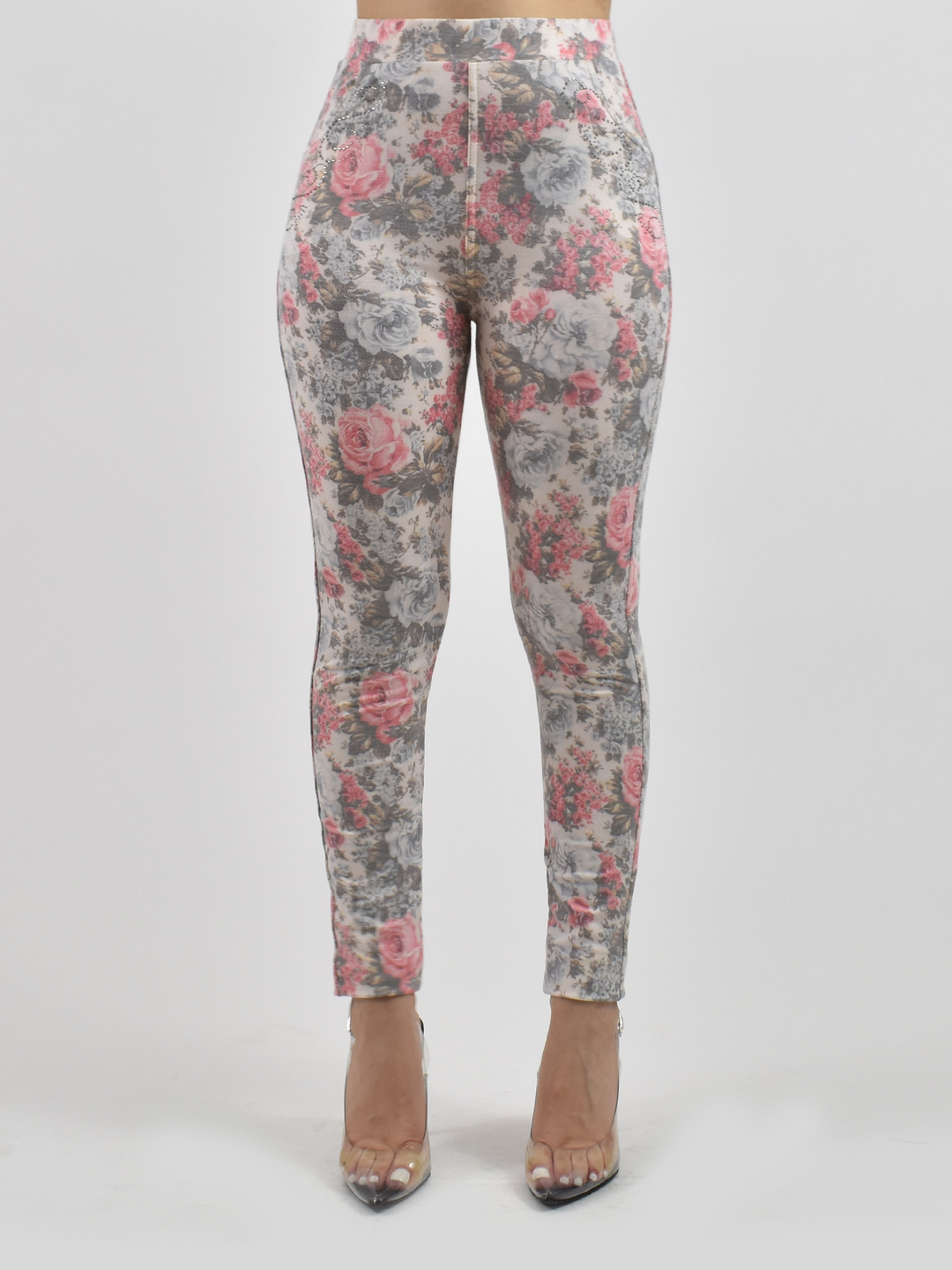 Close-up of pink floral jean texture showing realistic denim print and soft knit finish.