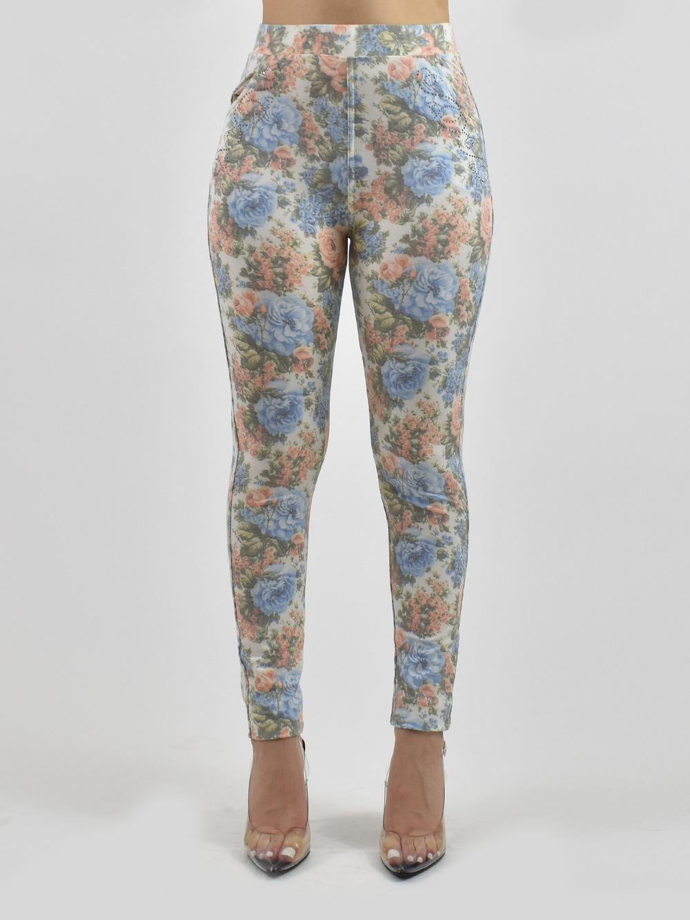 Women’s fitted blue floral jean leggings featuring adjustable waistband and convenient stretch pockets