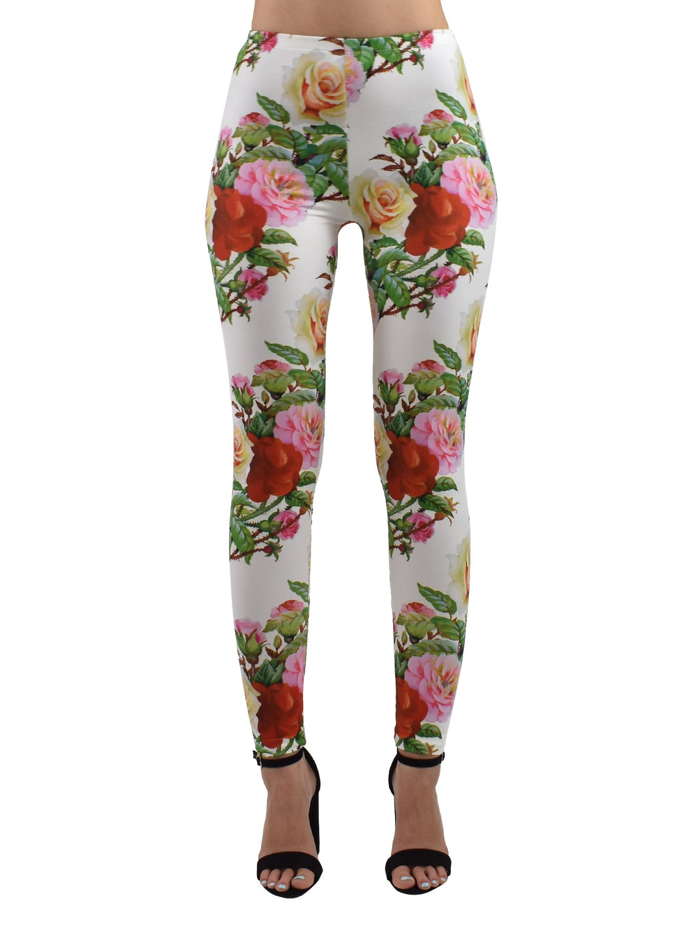 Front view of Denimaxx Rose Thorns leggings with multicolor rose print on white, studio shot with black heels.