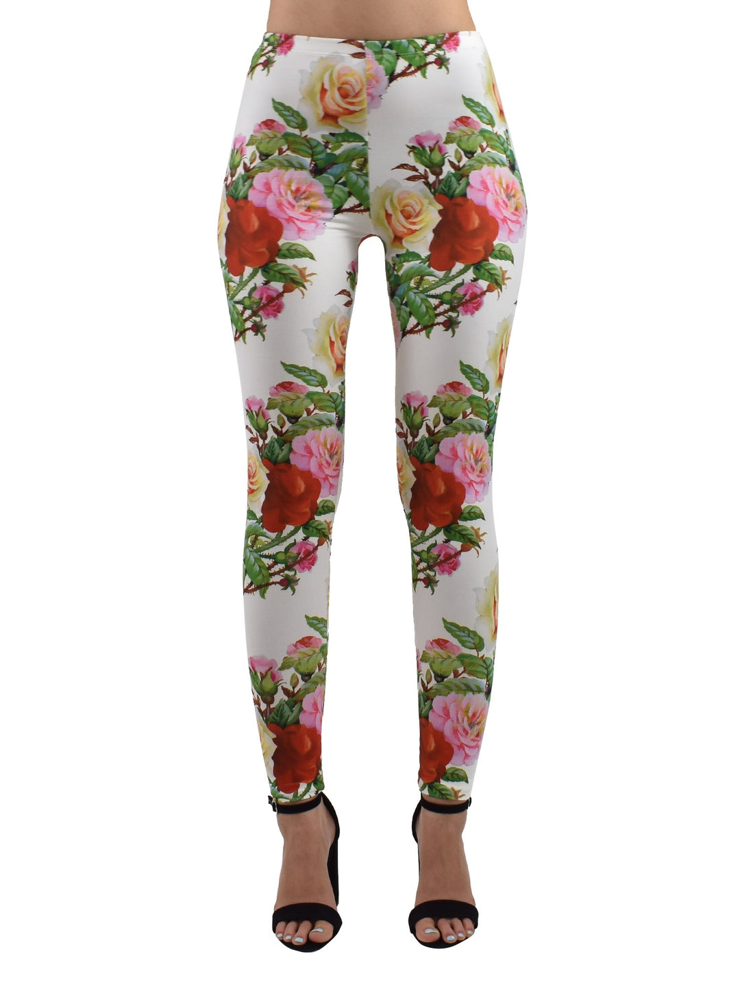 Front view of Denimaxx Rose Thorns leggings with multicolor rose print on white, studio shot with black heels.