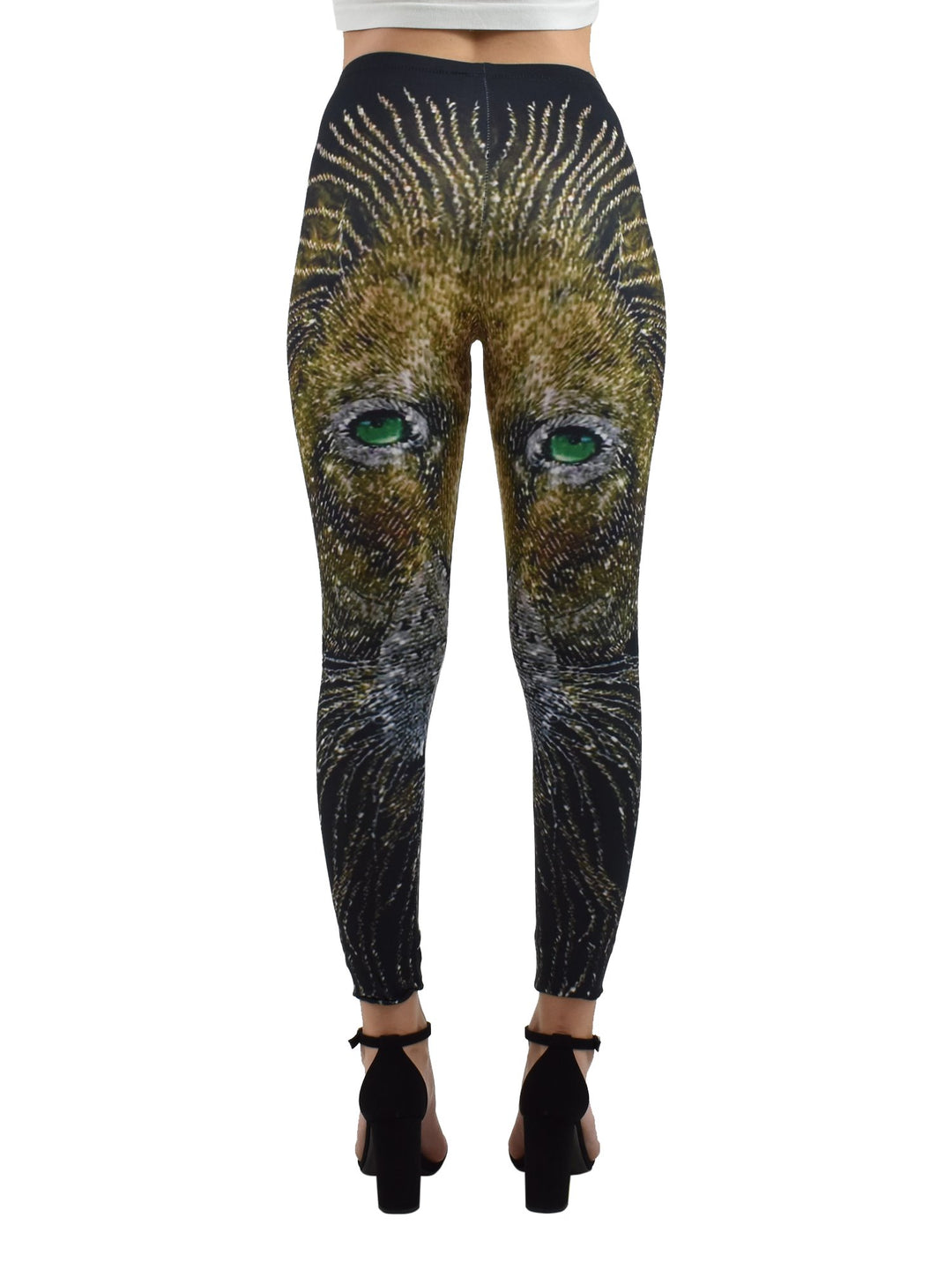 Back view of woman wearing Denimaxx Light of the Lion print leggings showing the golden lion artwork, black block heels.