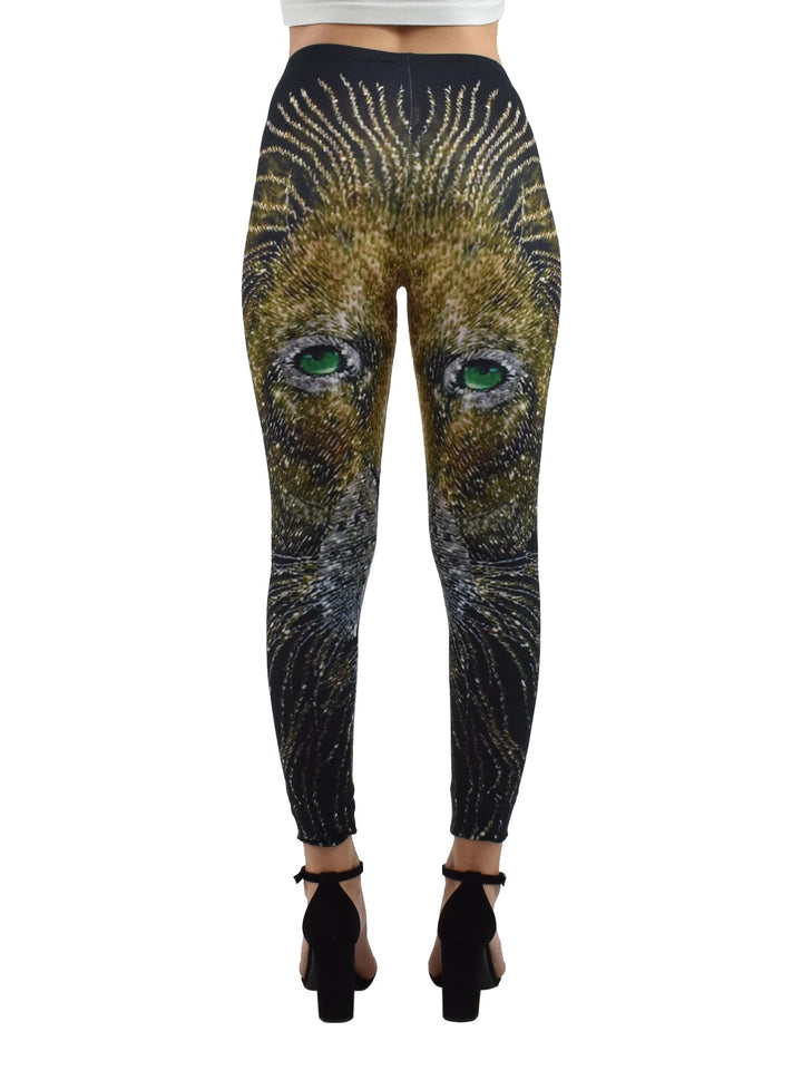 Back view of woman wearing Denimaxx Light of the Lion print leggings showing the golden lion artwork, black block heels.