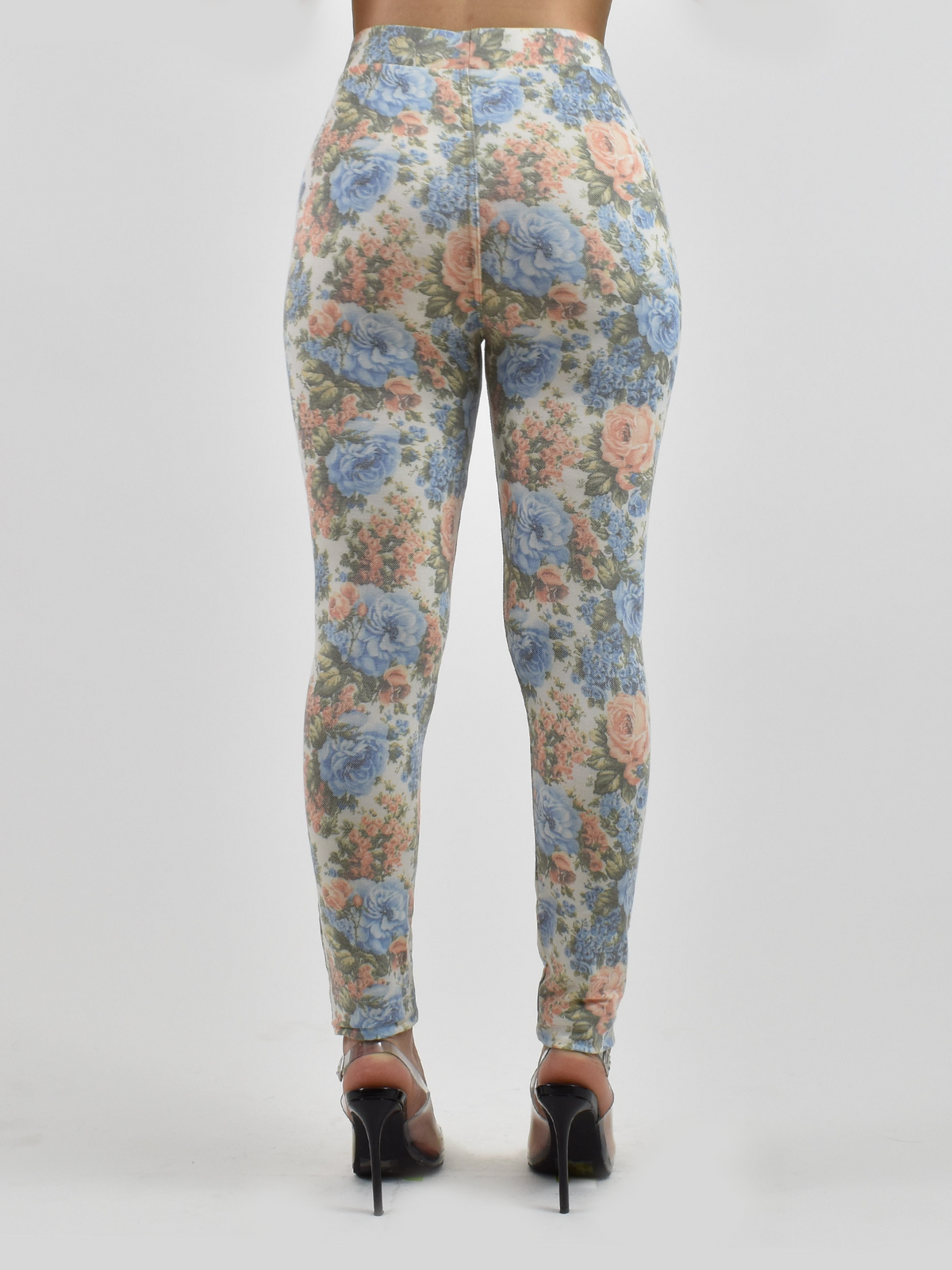 Back view of Blue Floral Jean Pocket leggings on a white background showing the all-over blue and peach floral pattern.