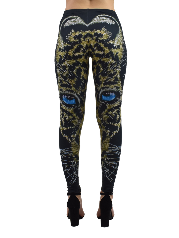 Back view of Denimaxx cheetah mosaic leggings showing the blue-eyed cheetah face artwork from behind on a studio model.