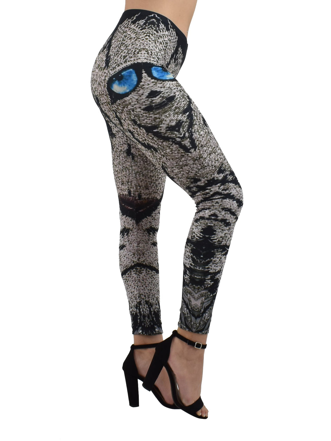 Side view of Denimaxx Lion Mosaics print leggings showing the mosaic lion face with blue eyes, black heels.