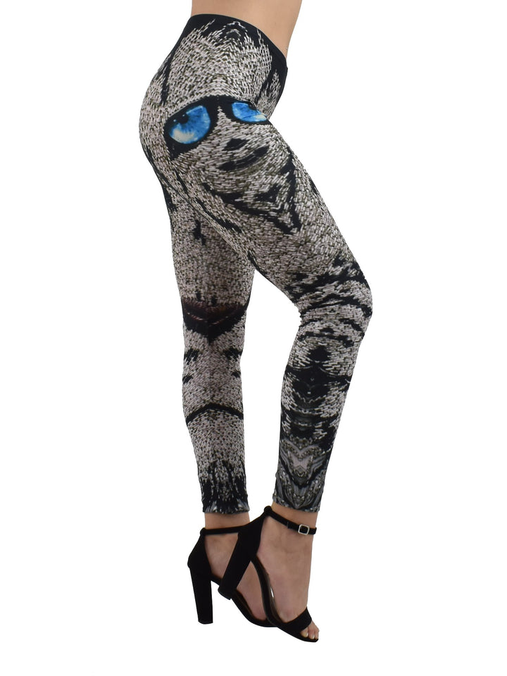 Side view of Denimaxx Lion Mosaics print leggings showing the mosaic lion face with blue eyes, black heels.