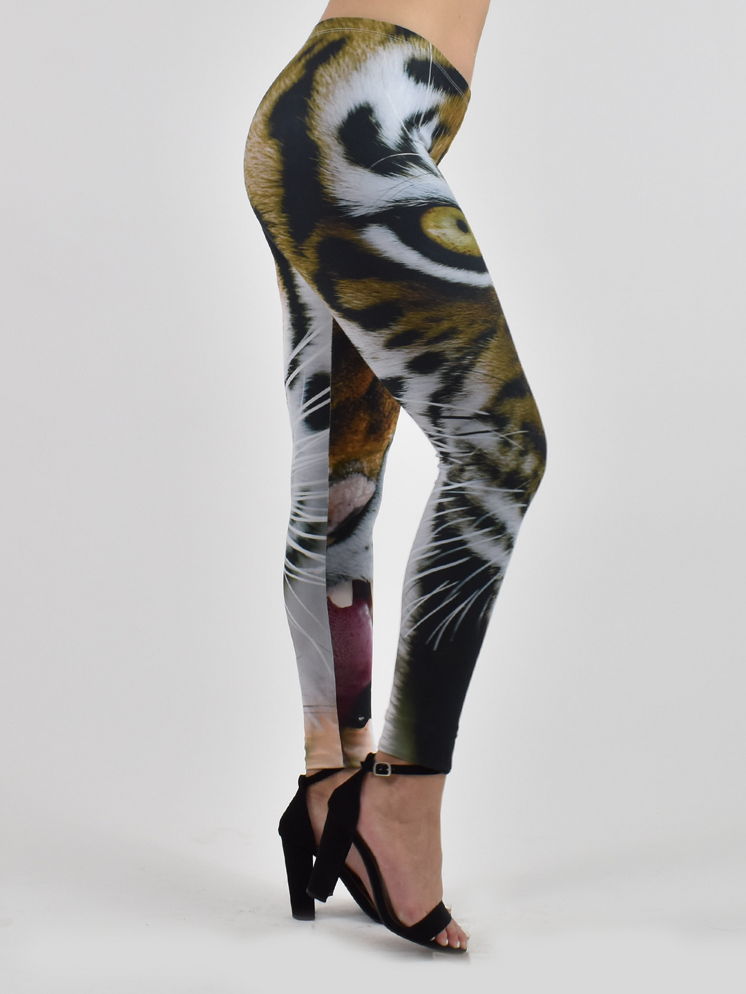 Side view of Denimaxx Women’s Furious Tiger leggings showing sleek fit and fabric detail.