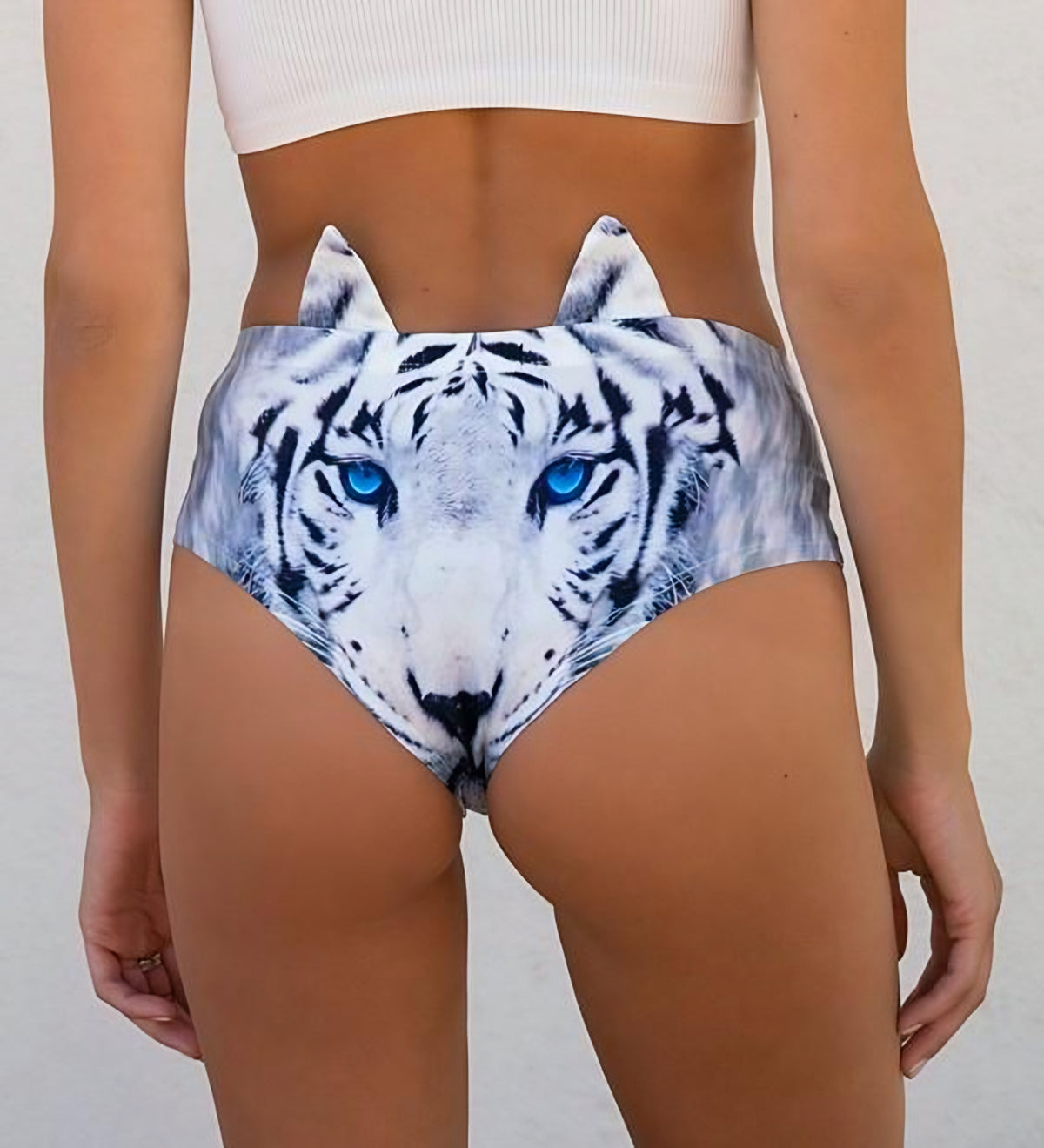 Close-up back view of Blue-Eyed Tiger print panties showing the white tiger face with blue eyes and ear tabs.