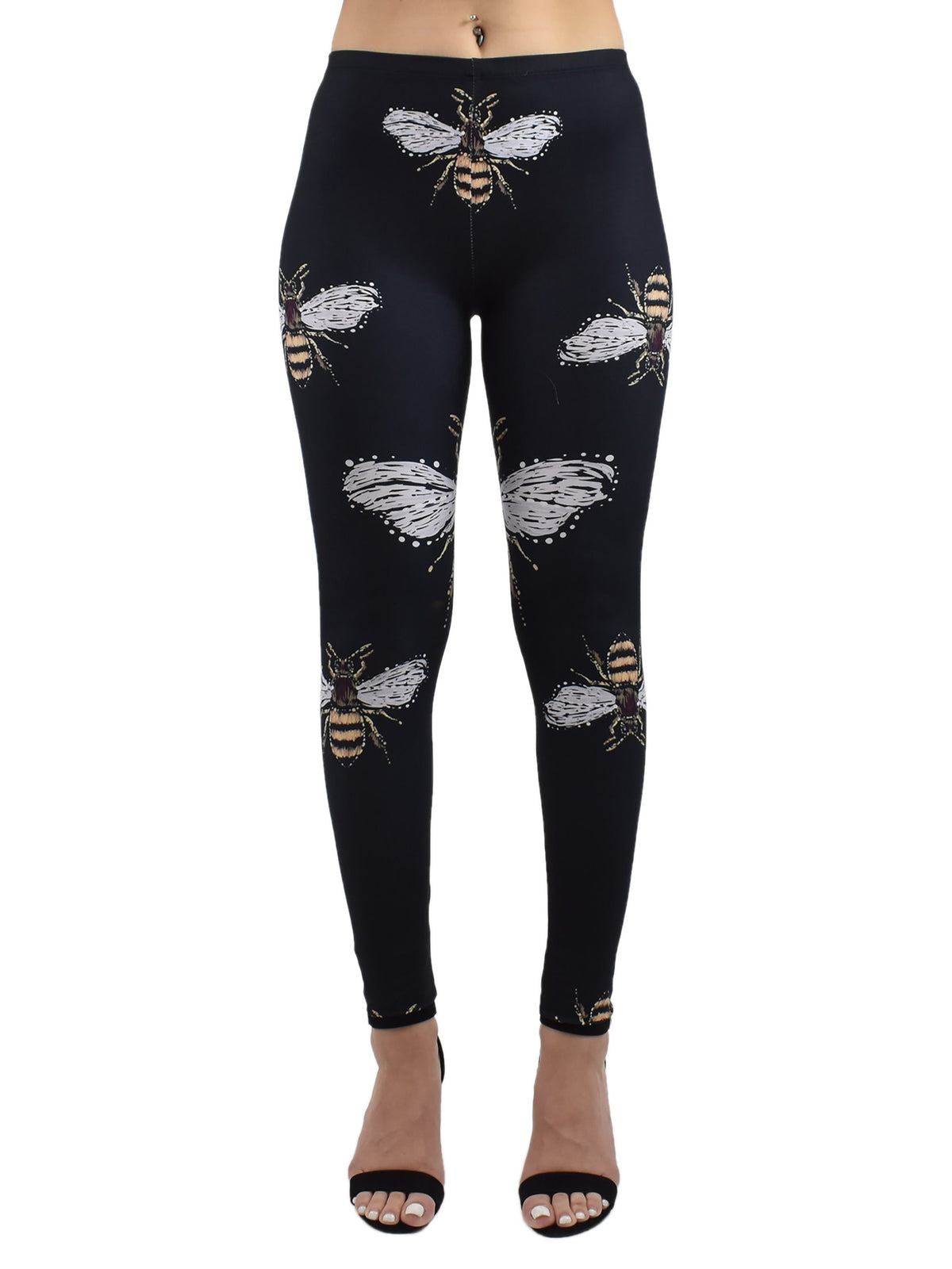Honey Bees print leggings with gold and white bee illustrations on black stretch fabric, front studio product shot.