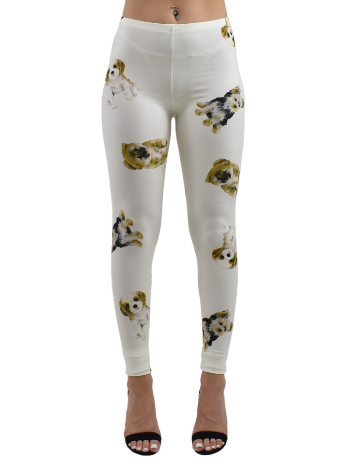 Model wearing Denimaxx Puppy Print yoga leggings featuring cute dog faces and a comfy waistband.